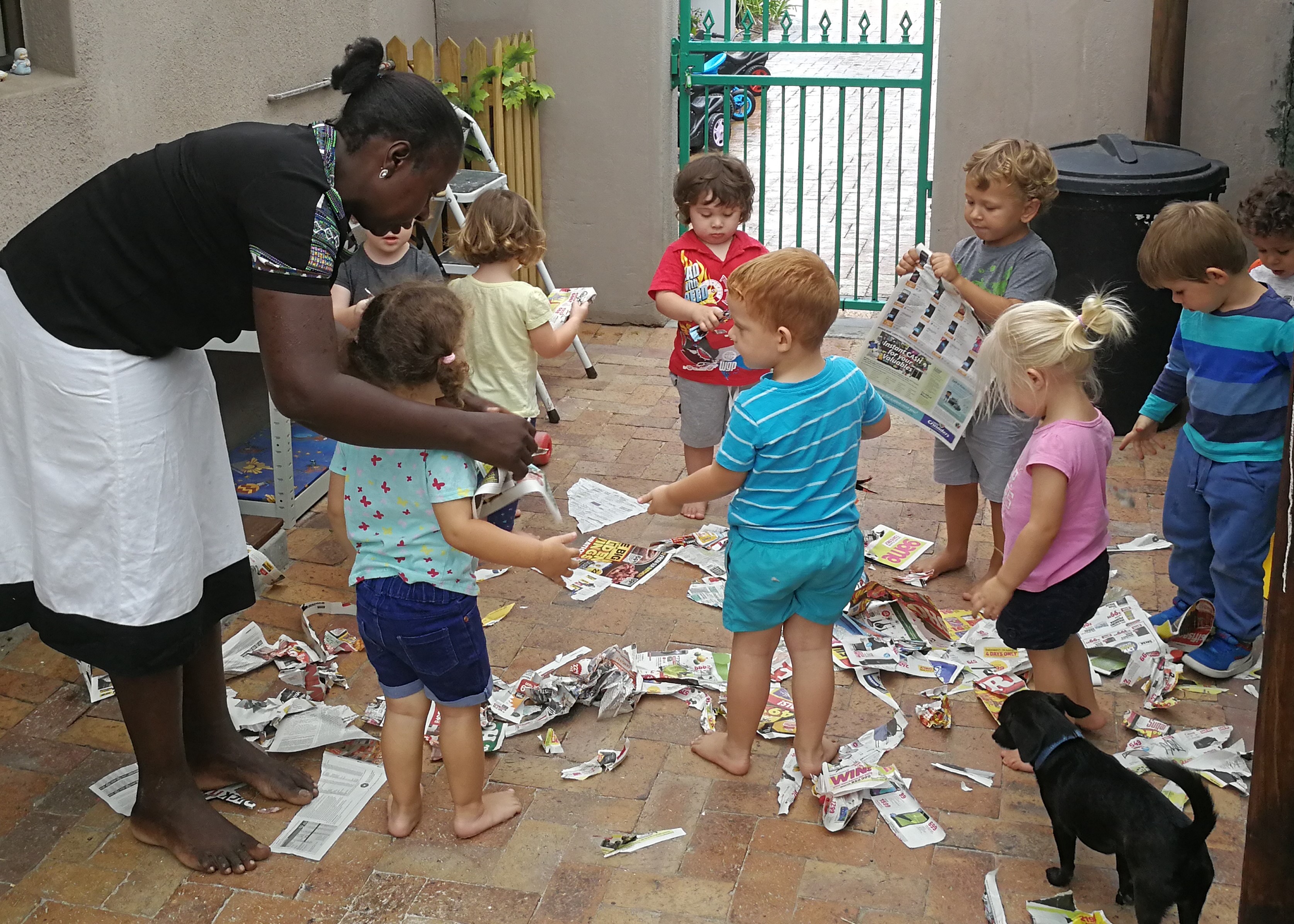 Children playing outdoors at Play Heaven